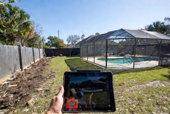 cleared backyard mandarin jacksonville fl hurricane idalia aftermath pool cage restored lawn clean crew GPS tablet documentation