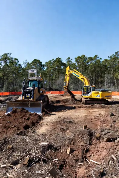 CAT D6N bulldozer with Trimble GPS grade control and Komatsu
PC360LC-11 excavator actively clearing and grading commercial
infill development site in Southside Jacksonville, FL, near
Baymeadows Road