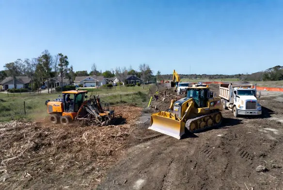Residential vs Commercial Land Clearing Jacksonville, FL — 5 Key Differences That Change Your Cost, Timeline, and Permits 1 residential vs commercial land clearingjacksonville fl side by side comparisoncat dozer and fecon mulcher duval countyTitle: Residential vs Commercial Land ClearingJacksonville FL — Equipment Comparison